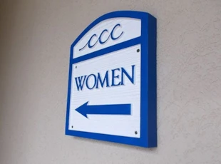 Sandblasted Wayfinding Restroom Sign