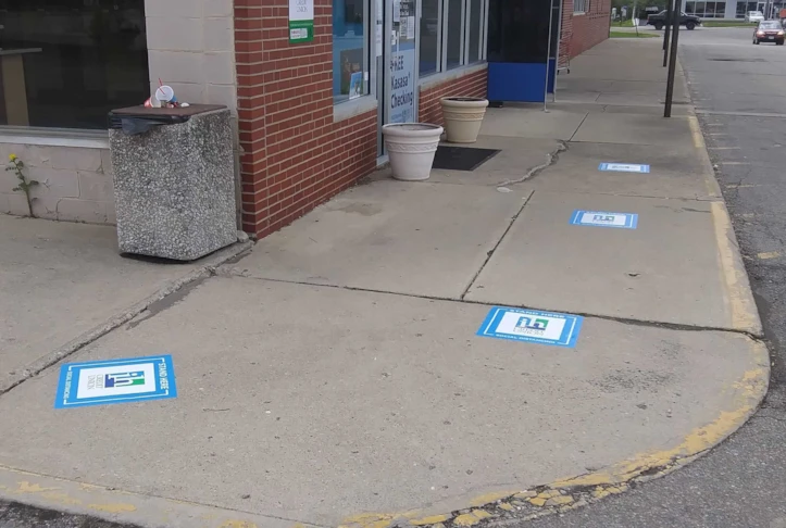 Social Distancing Floor Graphics for Credit Union Exterior