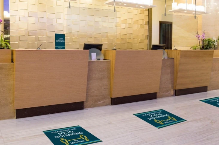 Social Distancing Floor Graphics Near Reception Desks
