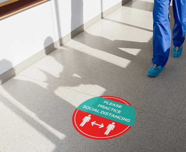 Social Distancing Graphics in Corridor