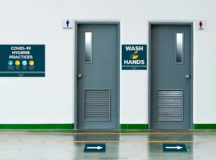 Health and Hygiene Signs Near Restrooms