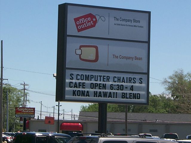 Digital printed translucent vinyl with lamination. On an illuminated Single pole sign