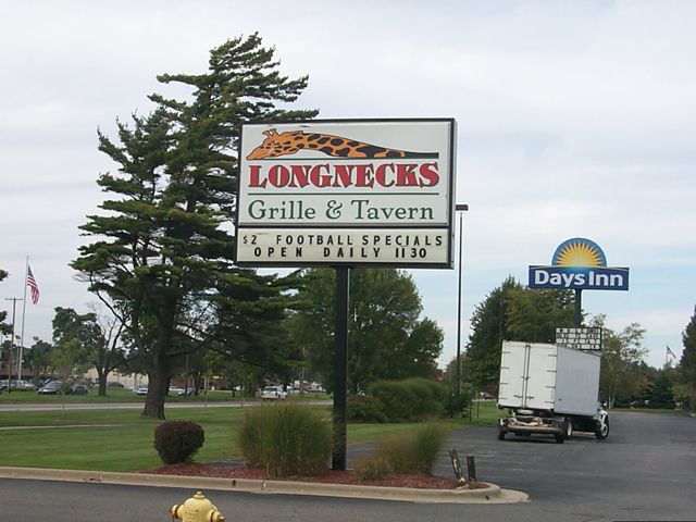 Digital printed translucent vinyl. On an illuminated pole sign