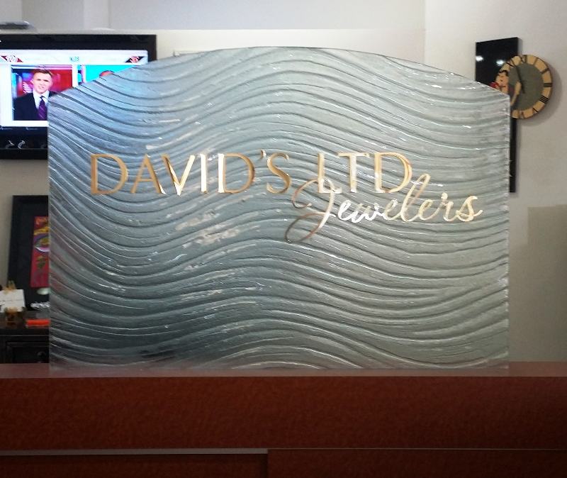 cut polished brass on decorative glass