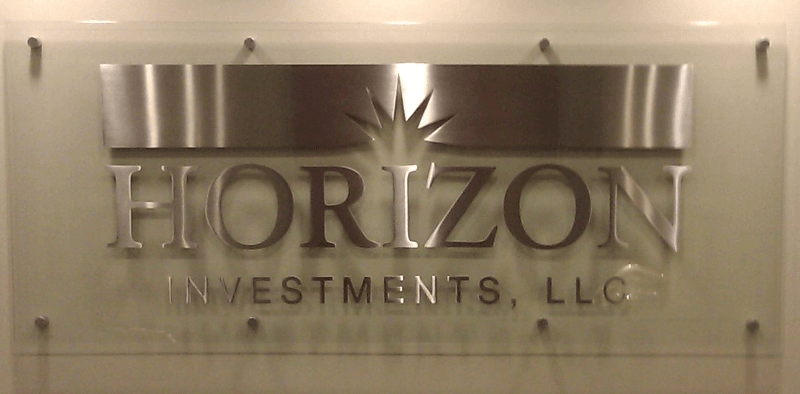 stainless steel cut letters and logo on glass