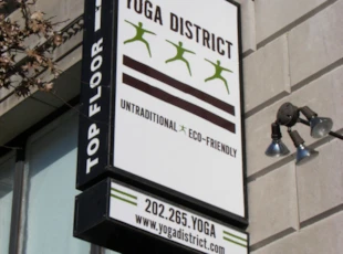 Lightbox Blade Sign for Yoga District in Washington, DC