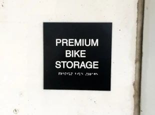 Custom ADA sign with braille for Cityline at Tenley in Washington, DC.