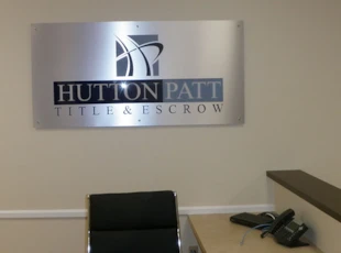 Silver Dibond Lobby Logo with Standoffs for Hutton Patt Title & Escrow