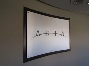 Brushed Silver Layered Lobby Logo for Aria by Rockville, MD