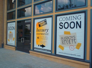 custom window display banners for coming soon under construction space