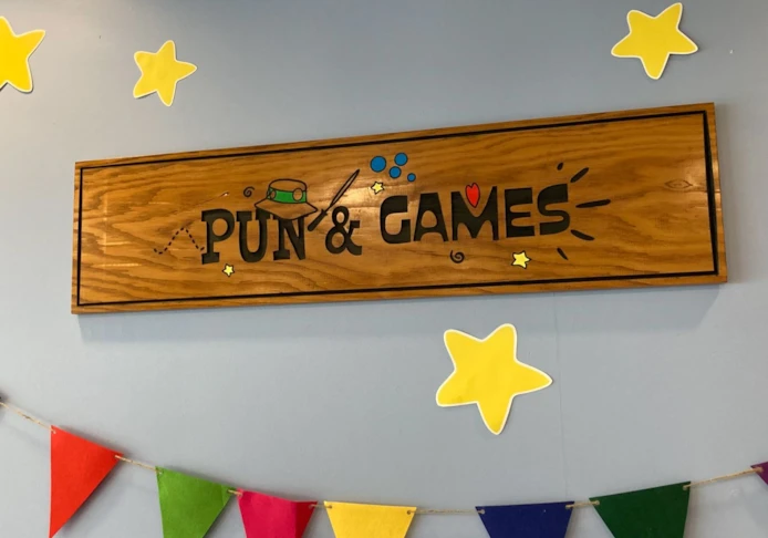 Wood Signs - Routed, stained and paint filled.