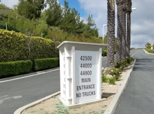 Triangle Directional Monument Sign at Entrance of Medline, FFF, NuFactor Entry 