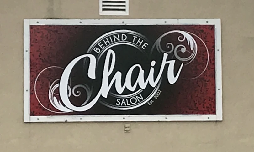 Custom designed exterior building sign panel