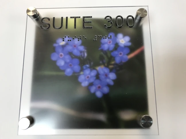 Custom Made ADA signs - With offset standoffs on multiple layers and and photographic quality printed backdrop - just about any photo will work for this process 
