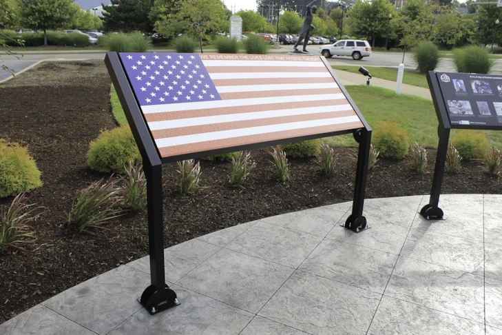 Interpretive Sign for 9/11 Memorial with USA flag