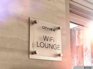Clear Acrylic Sign wiith Decorative Stand-off Screws and Brushed Aluminum Backer Panel