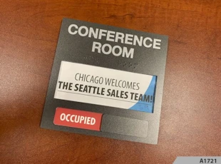 ADA Conference Room Sign with Window Insert - Chicago welcomes the Seattle Sales Team