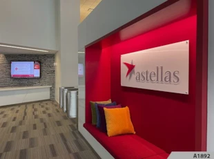 White Acrylic Sign Panel with 3D Acrylic Logo and 3D Letters installed in waiting area  | Hospitality & Lodging | Wheeling, IL | Acrylic