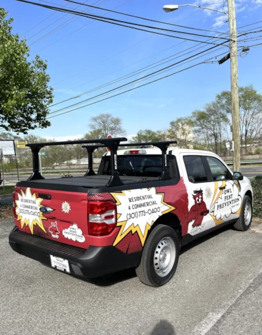 Custom vehicle wrap for Owl Pest Control